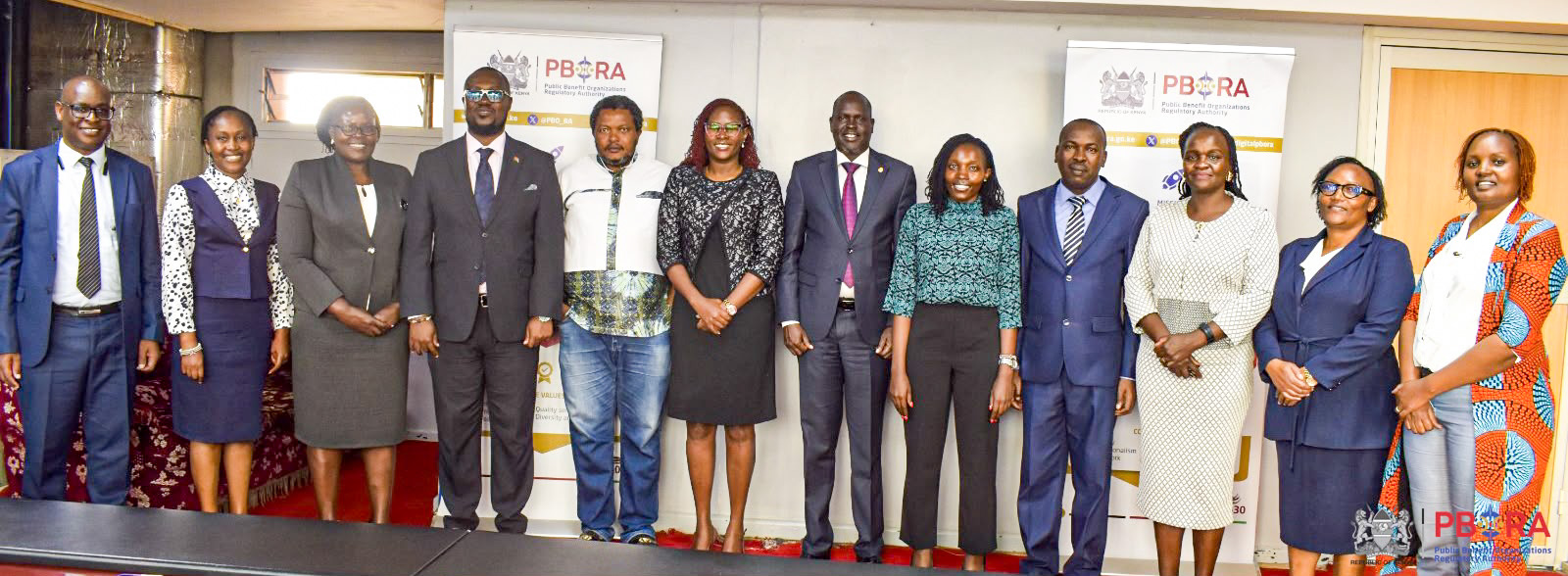 Members of the PBODT pose for a photo with the senior management of the PBORA led by Dr. Laxmana Kiptoo in the PBORA's Boardroom.