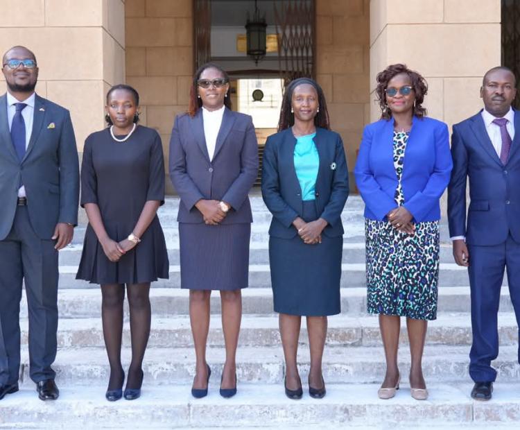 Members of the Public Benefit Organizations Disputes Tribunal pose for a photo outside the Supreme Court, Nairobi, after their swearing in.