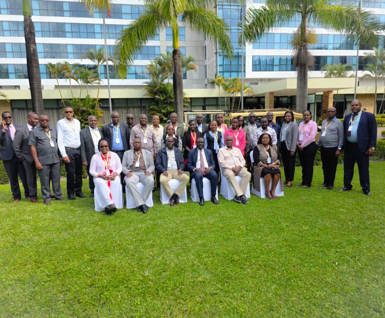 Senior government officials pose for a group photo at the Mount Meru Hotel, Arusha, in Tanzania after attending a high-level workshop on Terrorism Financing and Targeted Financial Sanctions